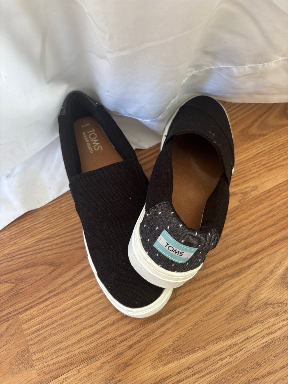 TOMS Women’s Black Slip-On Sneakers
